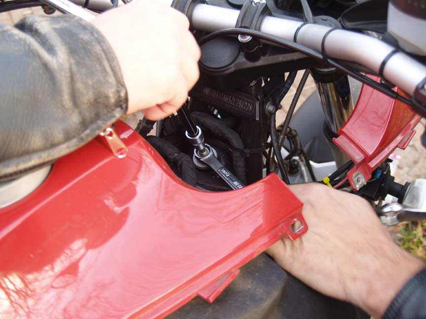 9%20remove-upper-shock-nut.jpg
